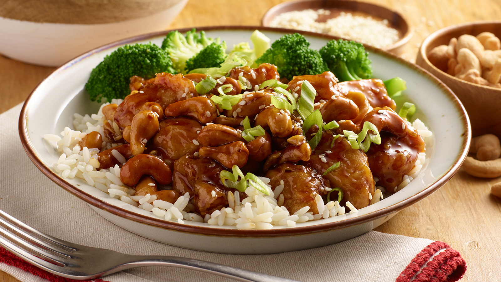 Dish filled with PLANTERS cashew chicken.