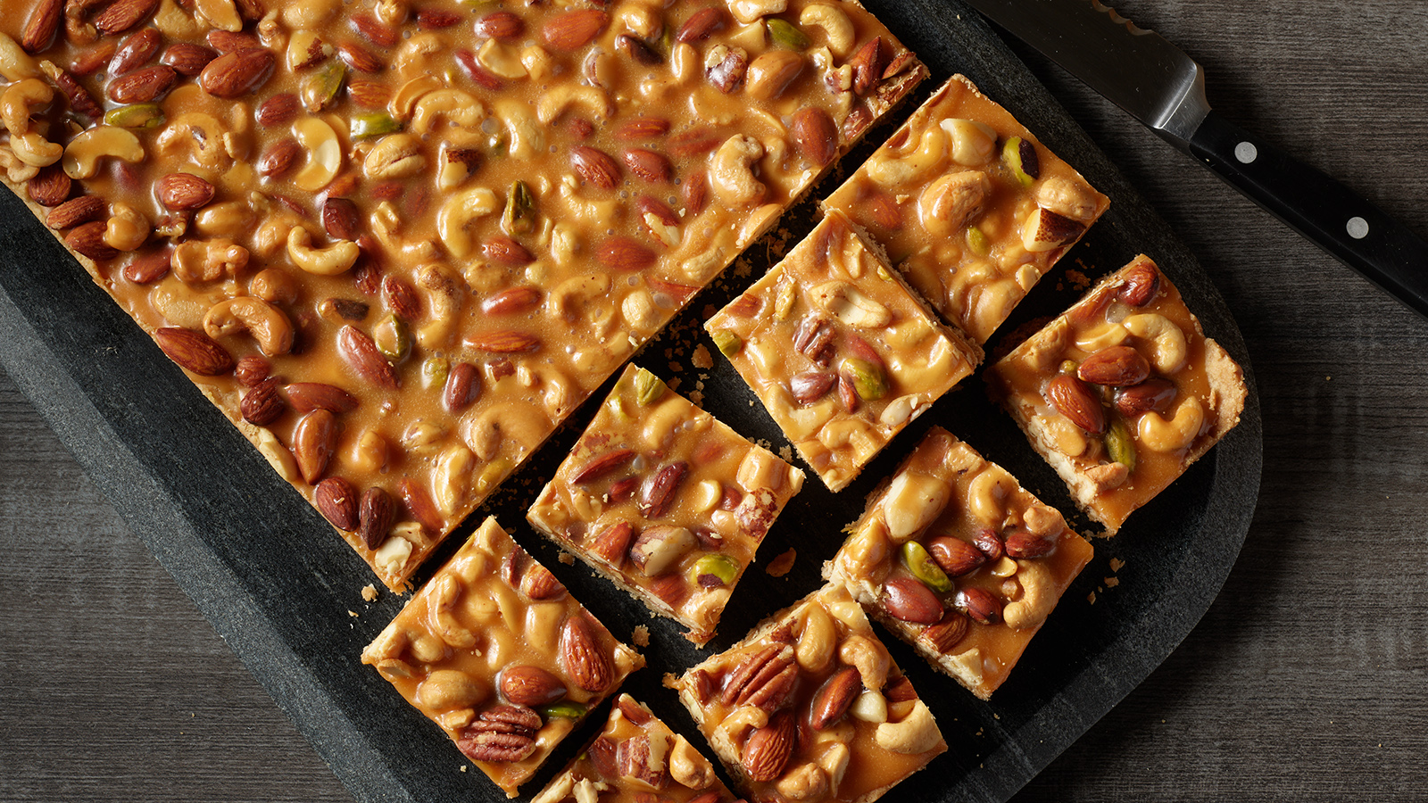 Platter of salted mixed nut bars.
