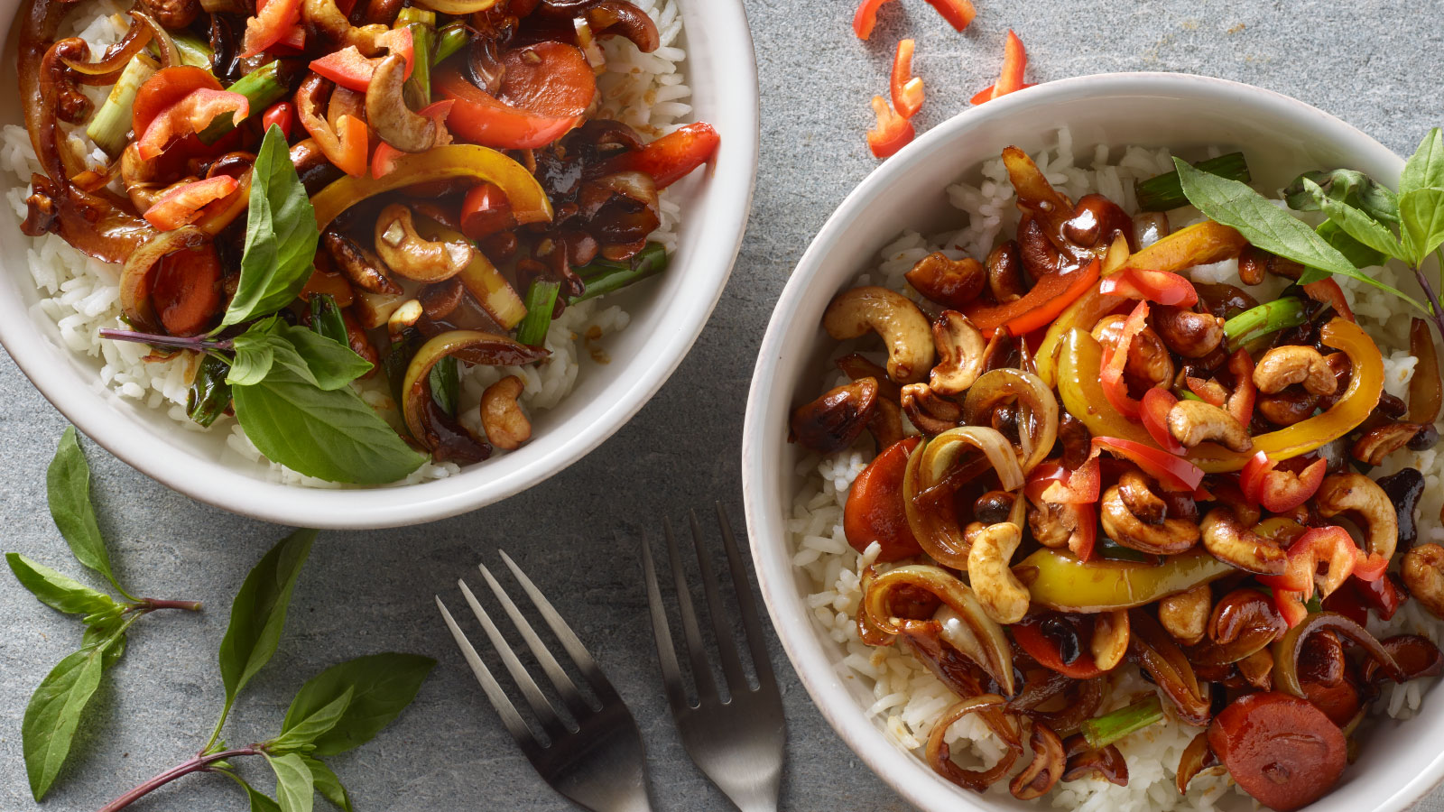 Bowls of vegetable cashew stir fry.