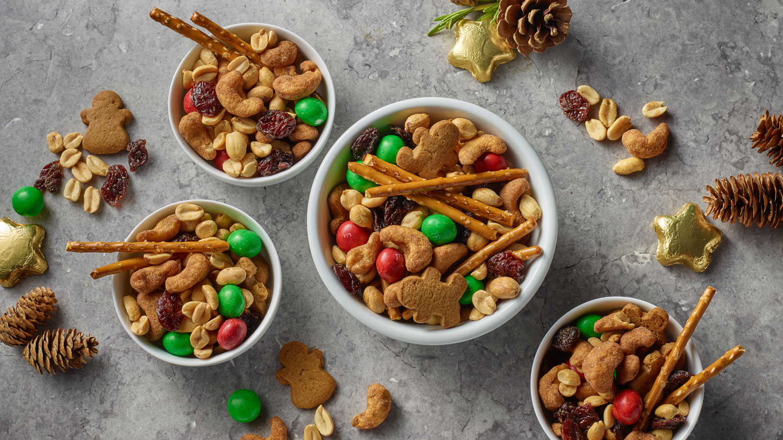 Whether you're hosting a festive soirée, cozying up by the fire, or looking for a quick snack to share, our Holiday Snack Mix is your go-to choice.
