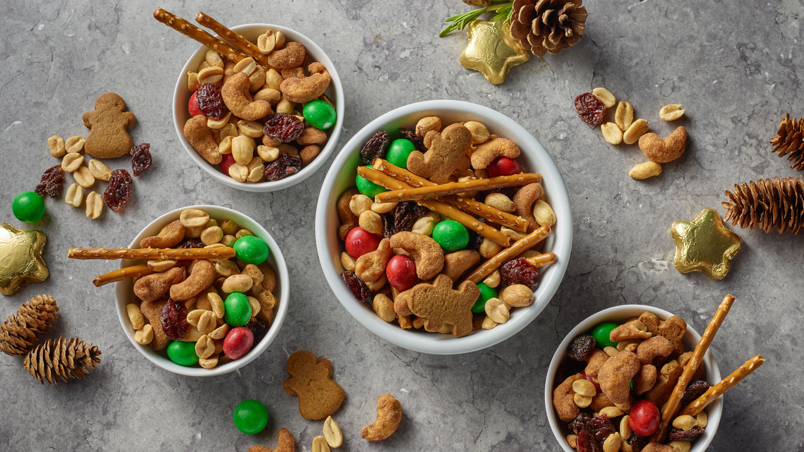 Bowls of PLANTERS holiday snack mix.