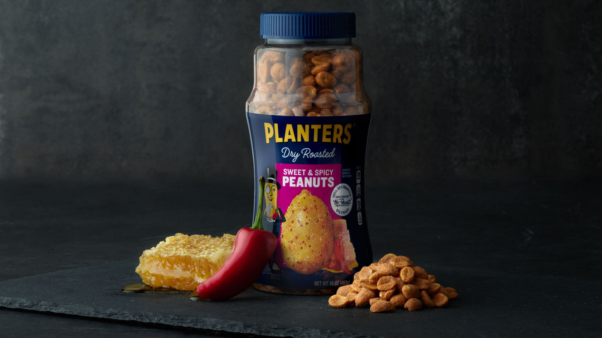 Promotional photo of planters sweet and savory spicy peanuts
