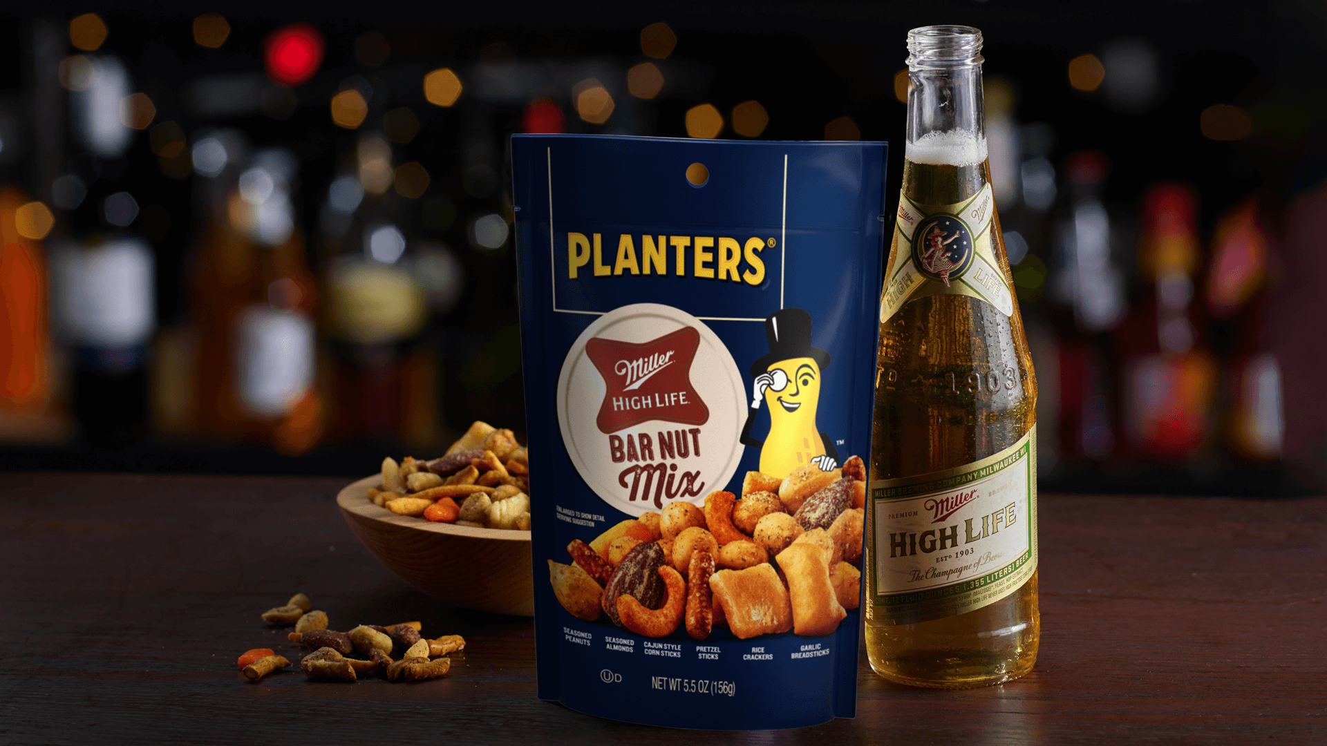 Planters bar nut mix on the bar with a miller high life