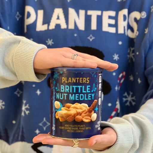 Planters holiday sweaters promotional photo blue sweater