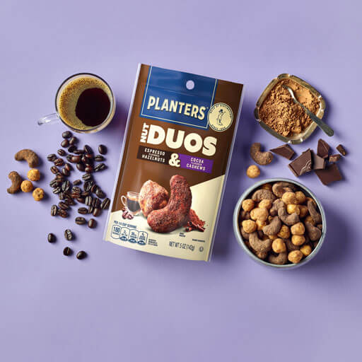 Planters duo espresso hazelnuts and cocoa cashews promotional photo on a purple background
