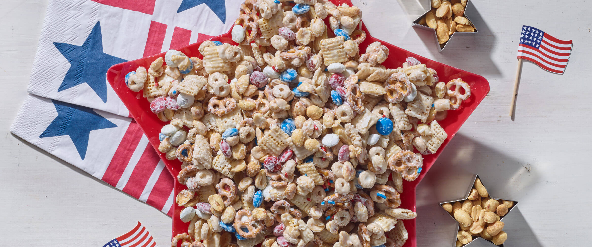 Red while and blue snack mix with fourth of july decor