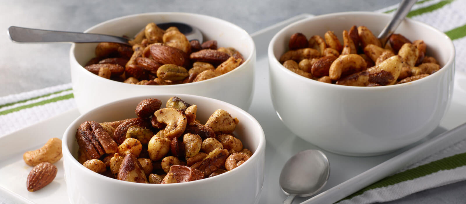 Bowls of deluxe lightly salted mixed nuts on a counter