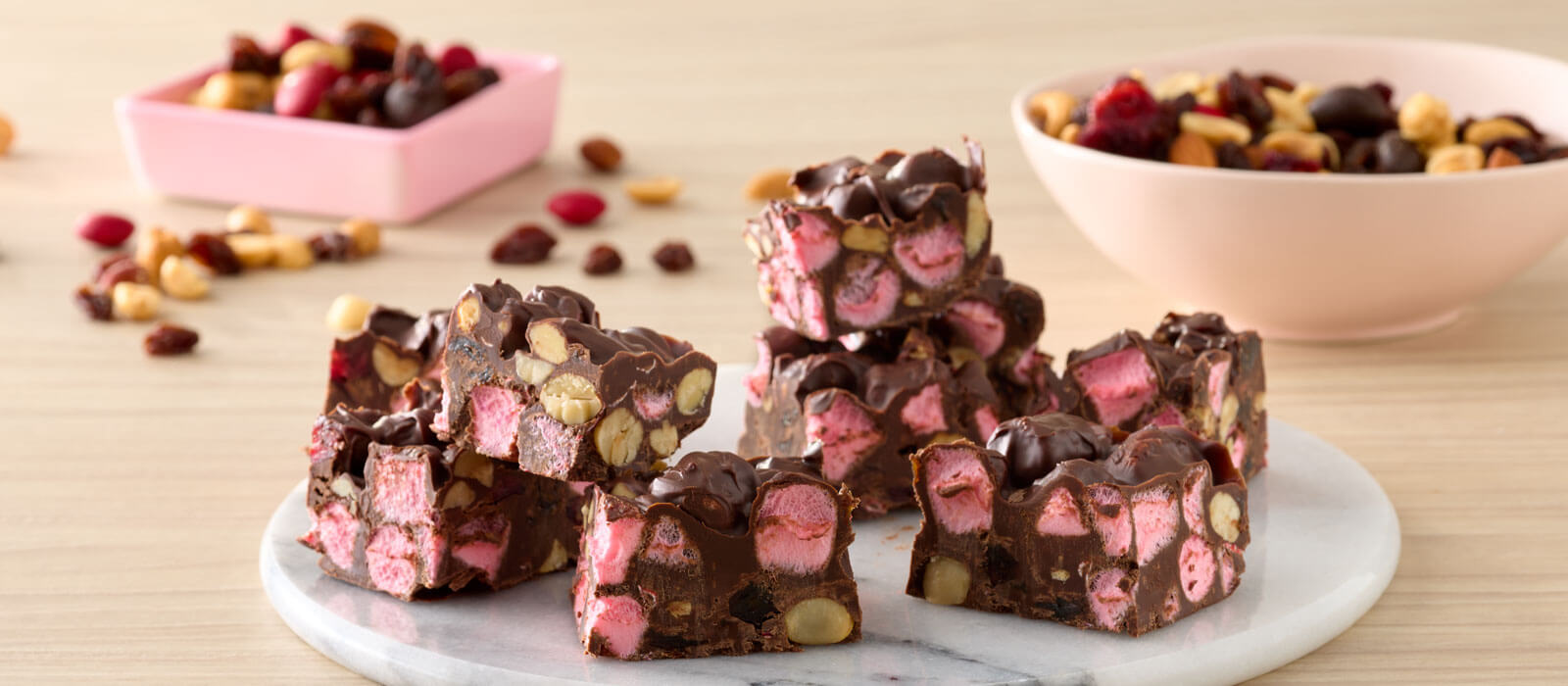 Holiday Nut Crunch Bars displayed on a tray on a counter