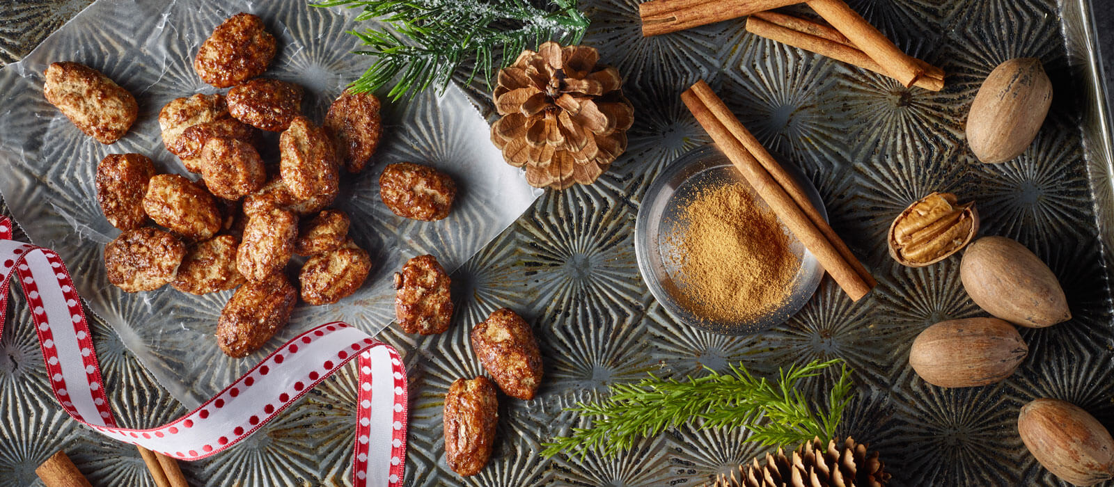 Planters butter cinnamon pecans promotional photo on a seasonal spread