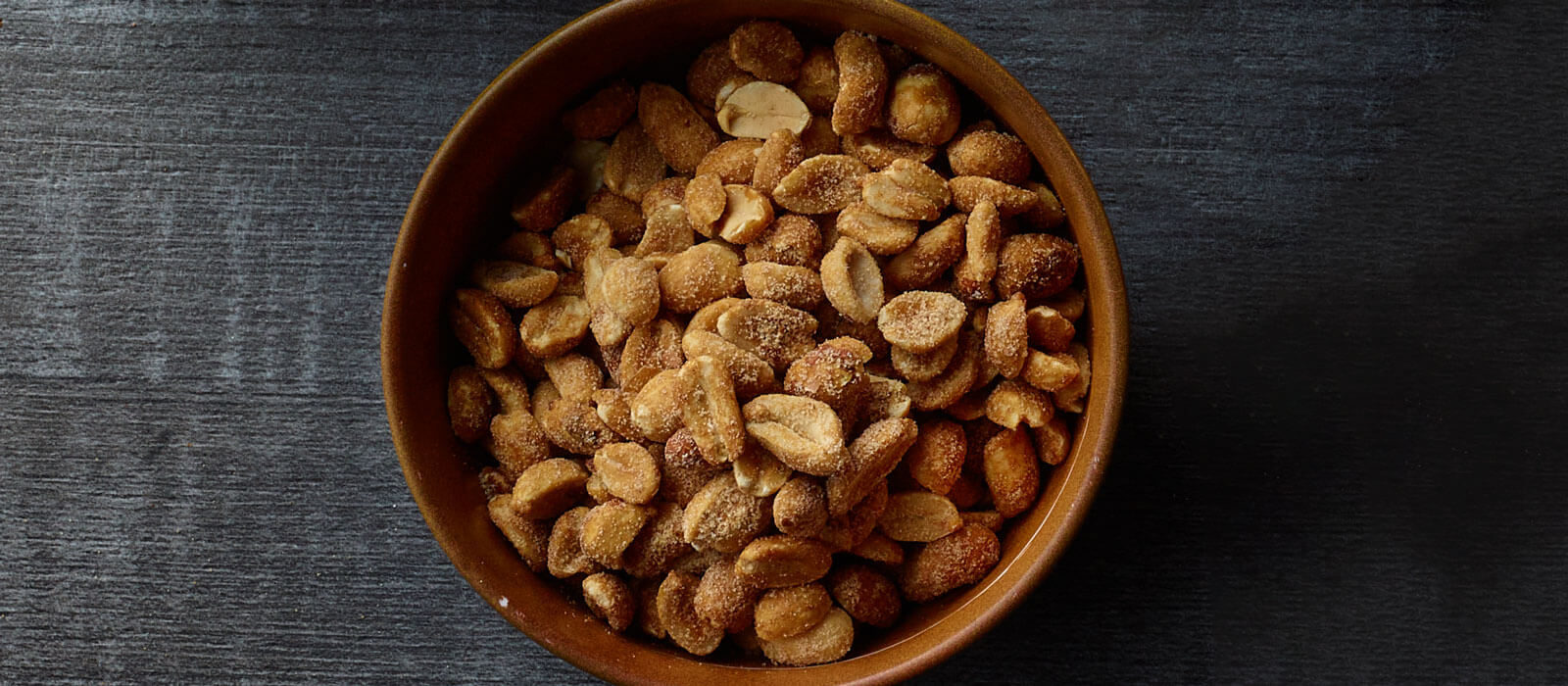 Sweet and spicy dry roasted peanuts in a bowl