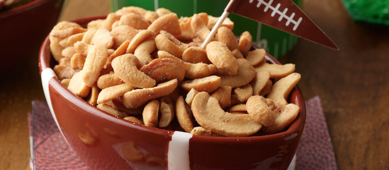 bowl of salted cashew halves and pieces