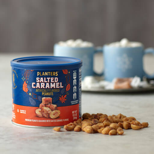 Promotional photo for planters seasonal salted caramel peanuts showing a can and nuts on a counter