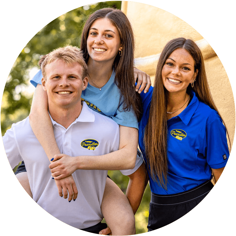 Planters Peanutters posing in front of Nutmobile