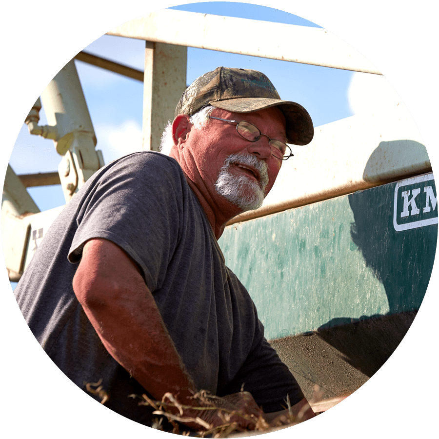 Peanut Farmer in field with equipment